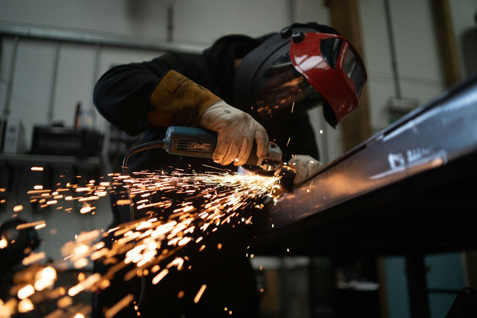 Metal work on stainless steel instrument tees with sparks
